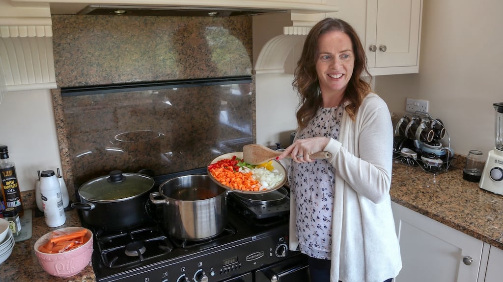 Bean an tí Mairéad Ní Dhroighneáin preparing a meal for students at her house in Spiddal, Co Galway. Photograph: Joe O’Shaughnessy