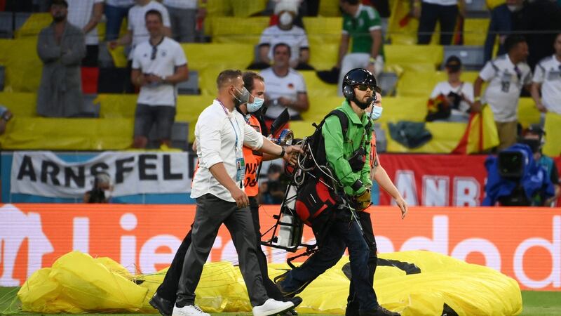 It was a lucky escape for a Greenpeace activist in Munich. Photograph: Franck Fife/Getty/AFP
