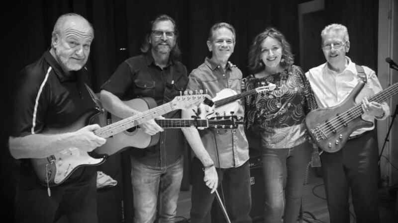 Stephen Travers and Yvonne Watterson, with the members of the Old Souls band