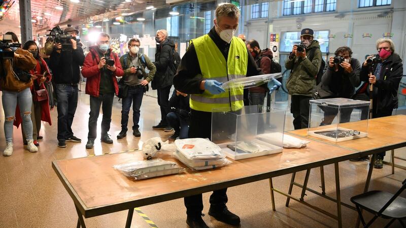 A city hall employee sets up a polling station in the Ninot market in Barcelona for the regional election being held on February 14th. Photograph: Lluis Gene/AFP via Getty Images