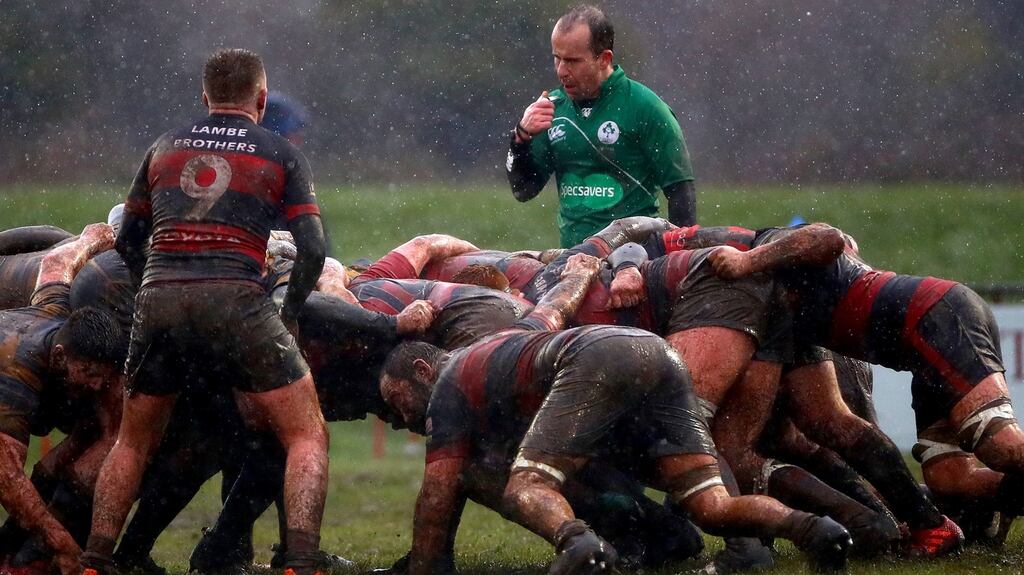 A recent clash between Tullamore and Bangor which was played in horrendous conditions. Photo: James Crombie/Inpho