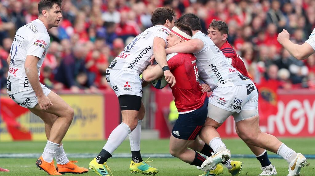 Gloucester’s Danny Cipriani tackles Munster’s Rory Scannell, resulting in a red card, during the Heineken Champions Cup match at Thomond Park. Photograph: Brian Lawless/PA Wire