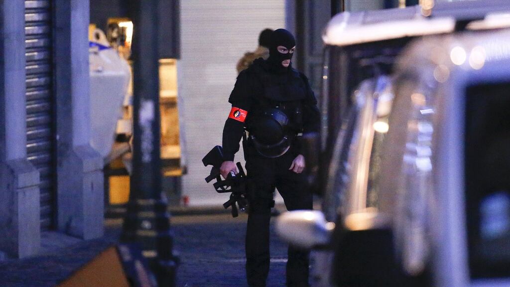 A Belgian special forces police officer patrols a street this week. Photograph: Yves Herman/Reuters