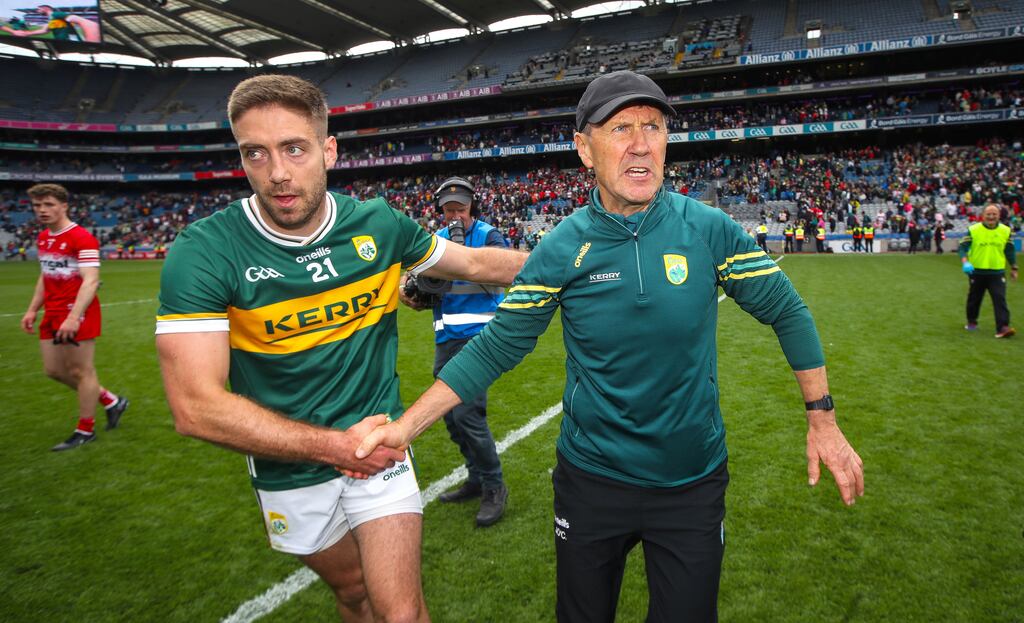 Jack O'Connor celebrates with Adrian Spillane after Kerry's victory over Derry at Croke Park. Photograph: Ryan Byrne/Inpho