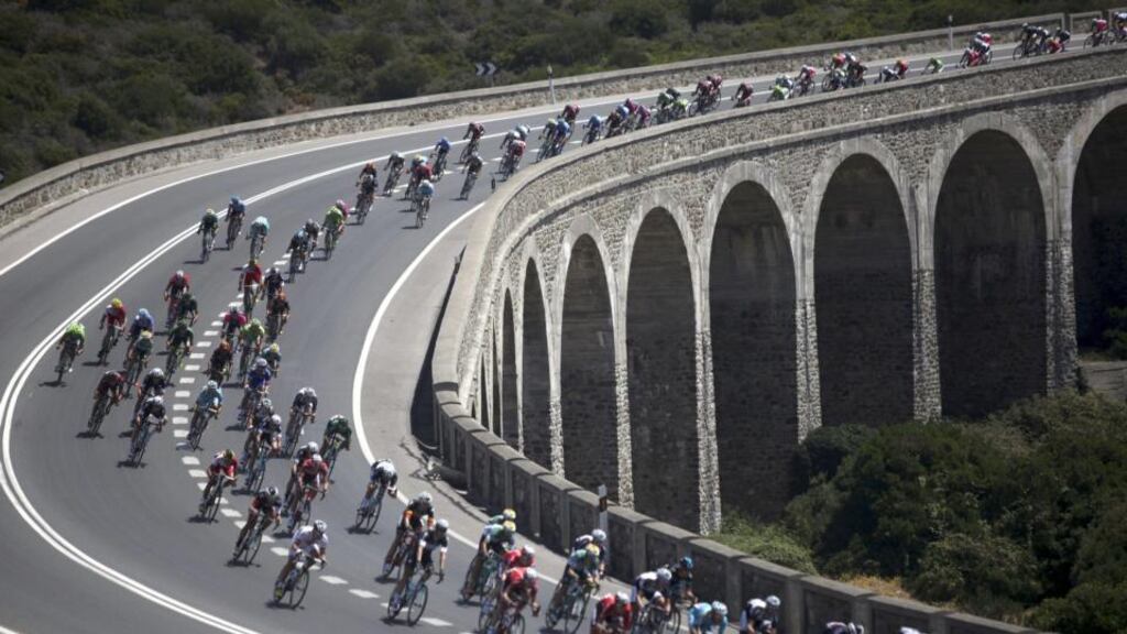 The peleton in action in action during the second stage of the Vuelta a España over 174.4km from Algeciras to San Fernando, southern Spain. Photograph: Carrasco Ragel/EPA