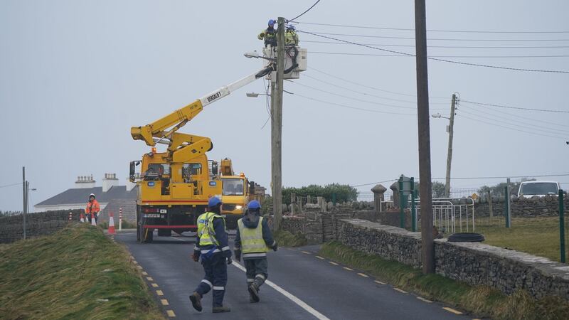 ESB crews restore power to homes in Spanish Point, Co Clare, after Storm Franklin hit. Photograph: Niall Carson/PA