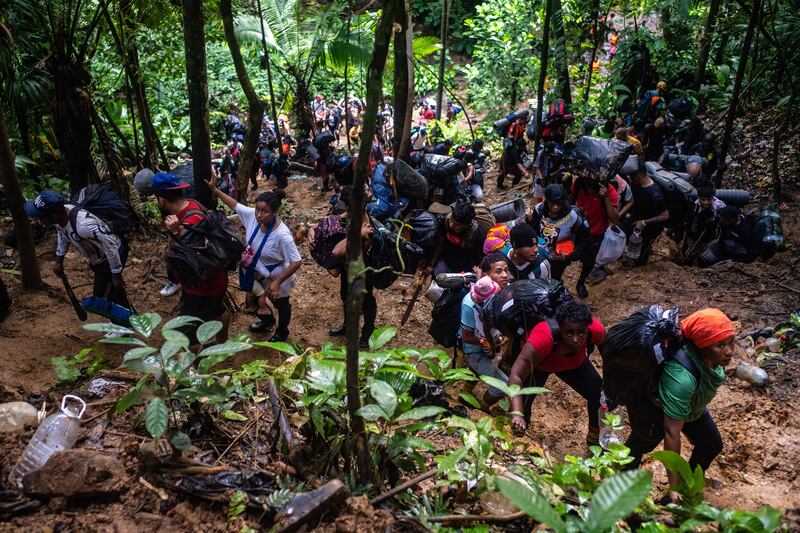 Mostly Venezuelan migrants crossing the Darién Gap between Colombia and Panama in September 2022. Photograph: Federico Rios/The New York Times