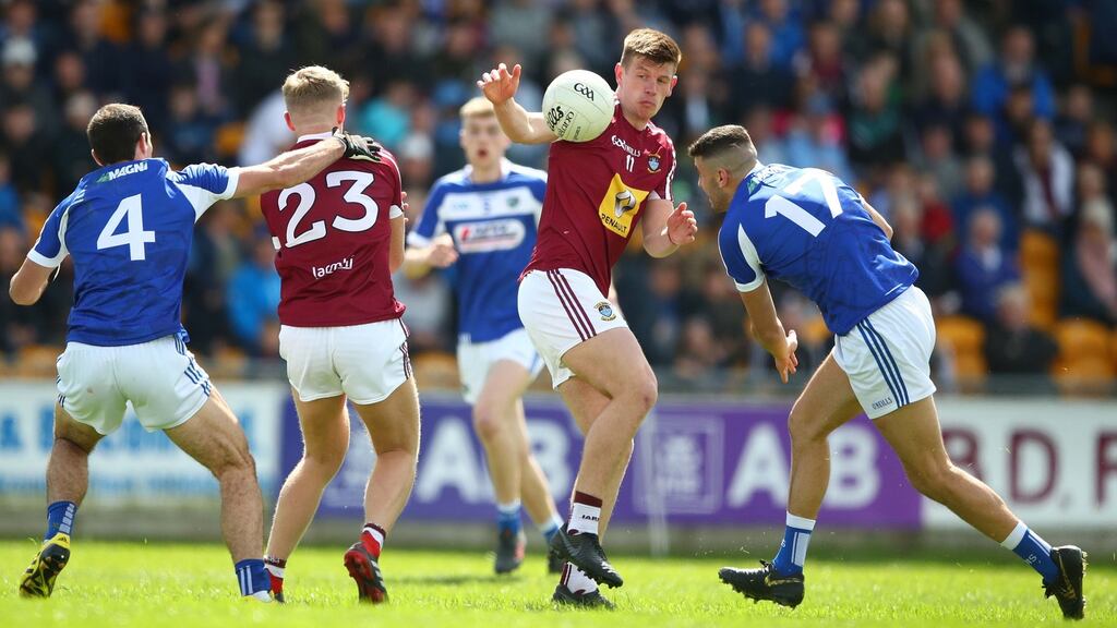 Westmeath’s John Heslin and Robbie Piggott of Laois in action during the Leinster championship clash at O’Connor Park, Tullamore. Photograph: James Crombie/Inpho