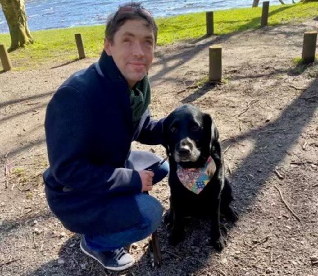 Martin Gordon pictured with his guide dog Juno, who, along with his partner and daughter, was with him when the rejection occurred