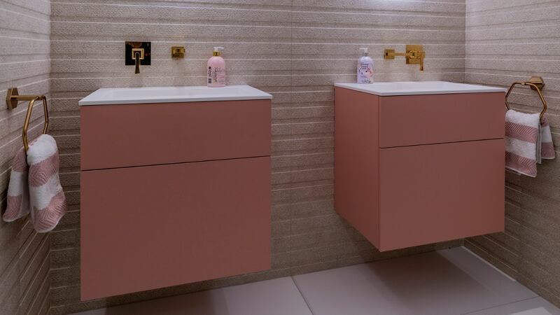 Proper storage is key to a clutter free bathroom. Pink bathroom storage units from TileStyle