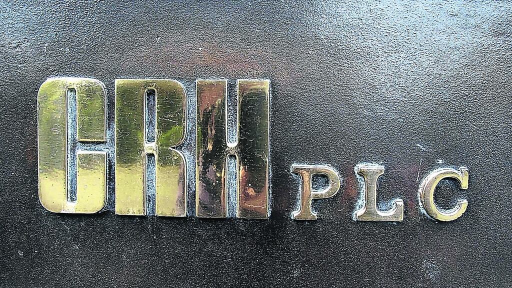 Building materials group CRH advanced 1.4 per cent to €25.13