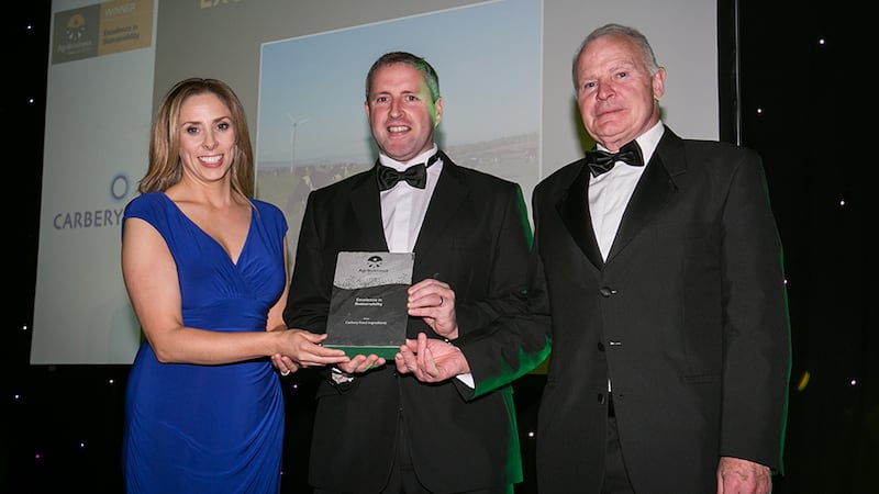 Dr. Karina Pierce, Lecturer, School of Agriculture and Food Science, UCD and Judging Co-ordinator, presents the Excellence in Sustainability award to Enda Buckley & J.J. Walsh, Carbery Food Ingredients