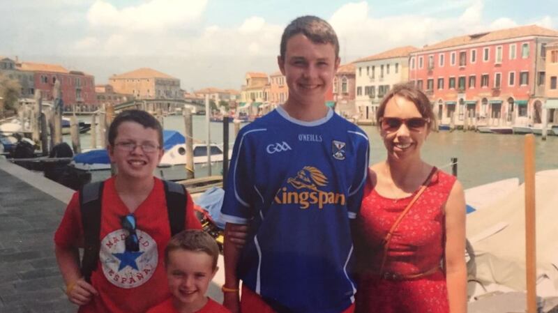 Clodagh Hawe with her sons Niall, Ryan and Liam. Photograph: Jacqueline Connolly