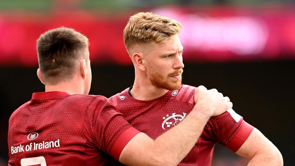 Ben Healy of Munster is consoled by Niall Scannell. Photograph: Alex Davidson/Getty