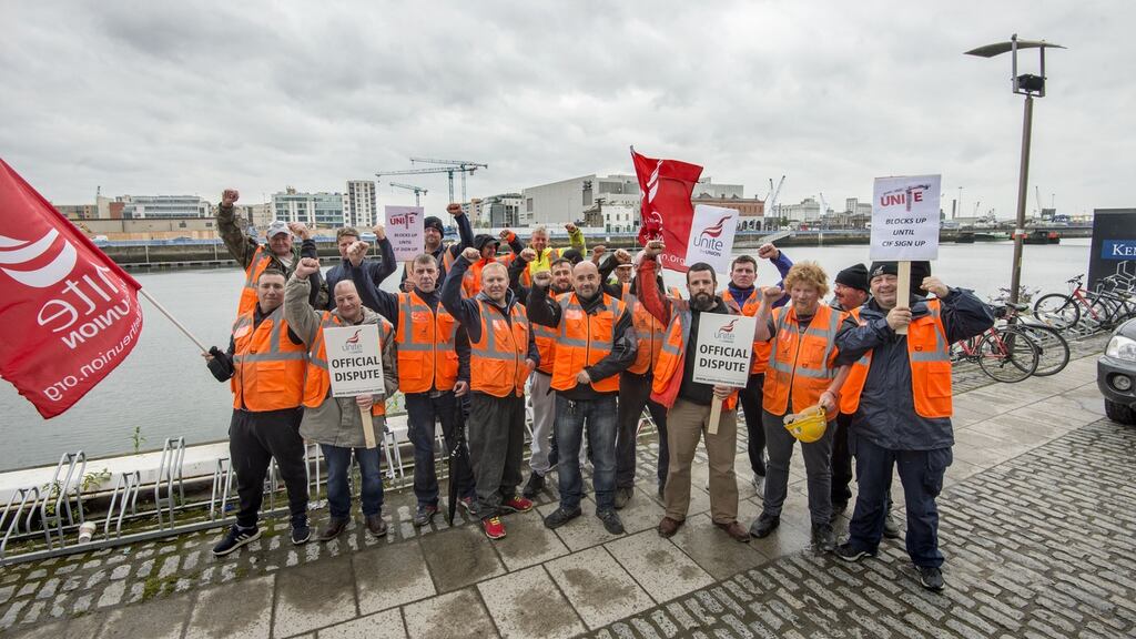 Striking crane drivers on Sir John Rogerson’s Quay, Dublin, last month. Photograph: Brenda Fitzsimons
