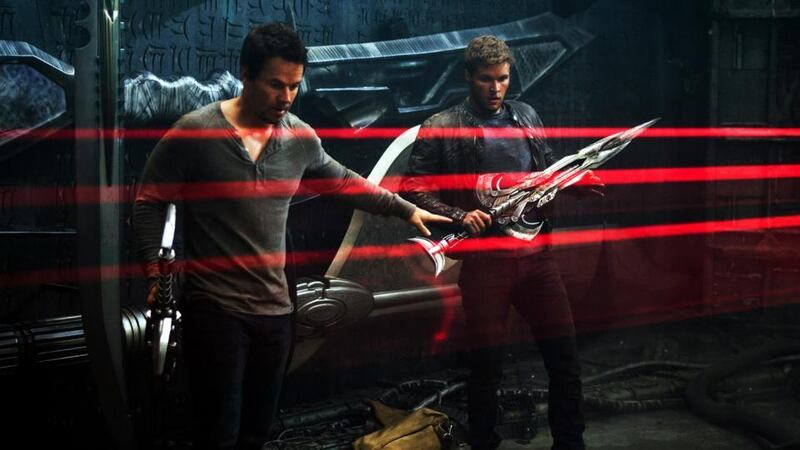 Mark Wahlberg as Cade Yeager and Jack Reynor plays Shane Dyson in Transformers: Age of Extinction.