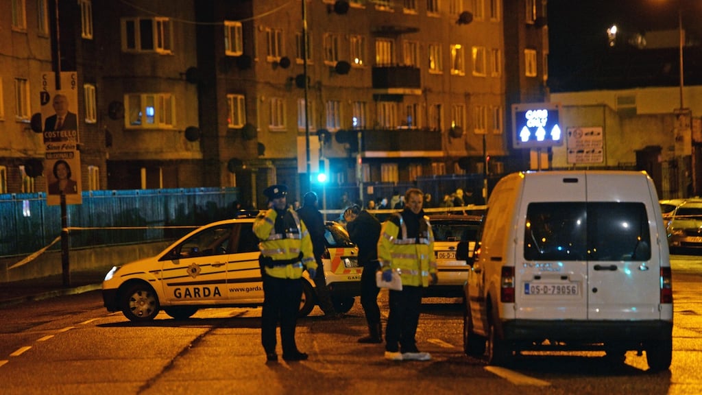 Gardaí at the scene of the shooting of Eddie Hutch at Poplar Row, North Strand, Dublin on Monday. Photograph: Eric Luke / The Irish Times