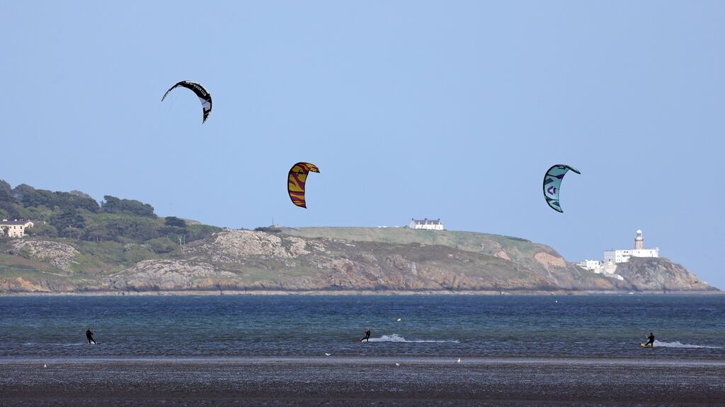 Kitesurfing off Dollymount, north Dublin, with Howth lighthouse in the background. Photograph Nick Bradshaw/The Irish Times