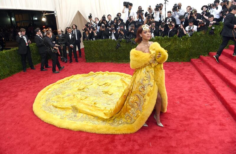 Rihanna arrives at the 2015 Met Gala in her  gold Guo Pei gown. Photograph:  Timothy A. Clary/ AFP/ Getty Images
