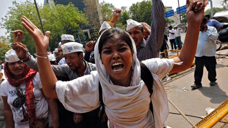 Demonstrators shout slogans during a protest outside police headquarters in New Delhi today. Photograph: Adnan Abidi/Reuters