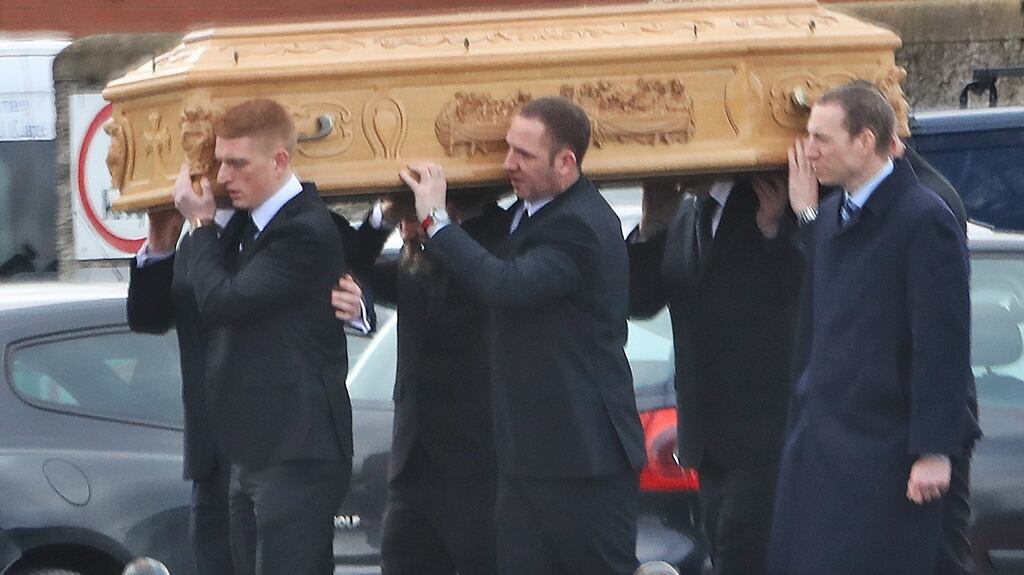The remains arrive at Our Lady of Consolation Church, Donnycarney for the funeral of Kenneth Finn two weeks ago. Photograph: Collins