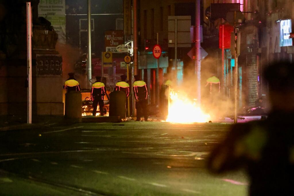 Public order unit and Gardai confront protestors in the aftermath of the Parnell square knife attack. Photograph: Alan Betson
