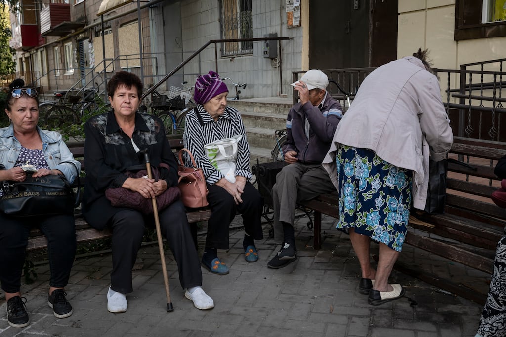 Residents of Pokrovsk, Ukraine, line up on Tuesday to register for financial assistance to purchase coal for heating and cooking as electricity to the city has been cut off for a week . Photograph: Nicole Tung/New York Times