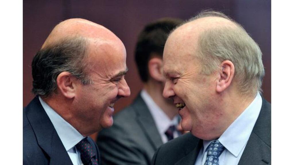 Spain's Finance Minister Luis de Guindos (left) and Minister for Finance Michael Noonan attend a euro zone finance ministers meeting at the European Union Council in Brussels. Photograph: Eric Vidal/Reuters