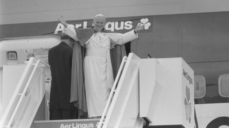 Pope John Paul II gives his farewells to the crowds gathered at Shannon before leaving the country on an Aer Lingus flight in 1979. Photograph: Dermot O’Shea