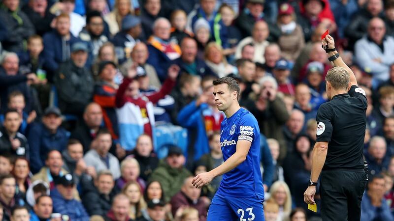 Seamus Coleman of Everton is shown the red card by referee Graham Scott  at Turf Moor. Photograph:  Alex Livesey/Getty Images