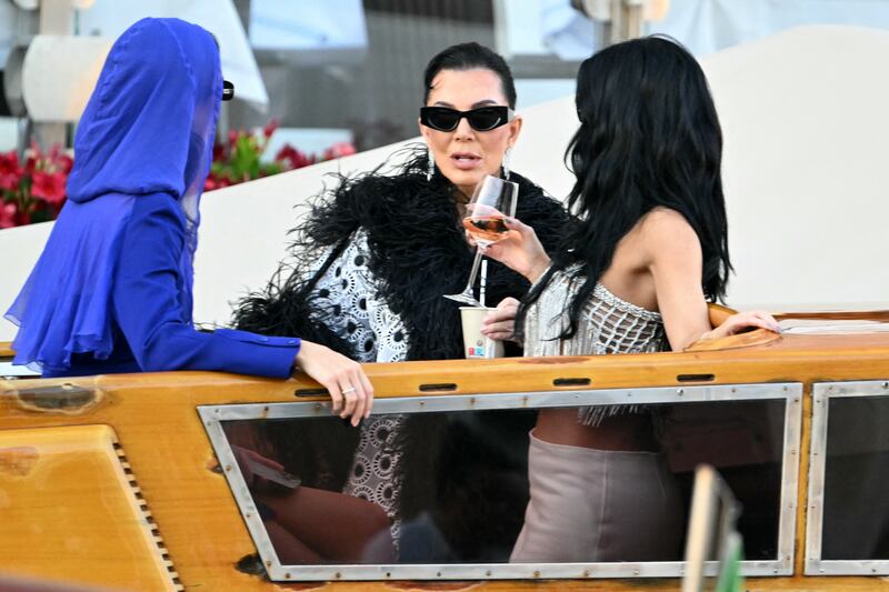 US model Kendall Jenner (left), US television personality Kris Jenner (centre) and Kylie Jenner leave the Gritti Palace Hotel for a party on the third day of the wedding. Photograph: AFP via Getty Images