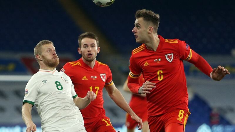 Daryl Horgan challenges in the air during Ireland’s loss in Wales. Photograph: Geoff Caddick/Getty/AFP