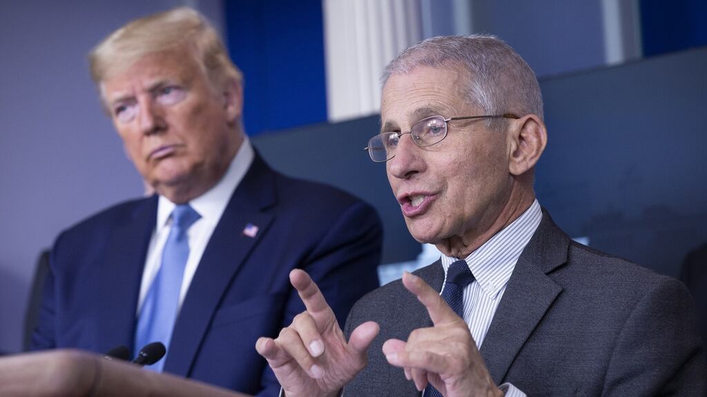 US president Donald Trump and Dr Anthony Fauci, director of the National Institute of Allergy and Infectious Diseases, during a Coronavirus Task Force news conference at the White House on Saturday.  Photograph: Stefani Reynolds/CNP/Bloomberg