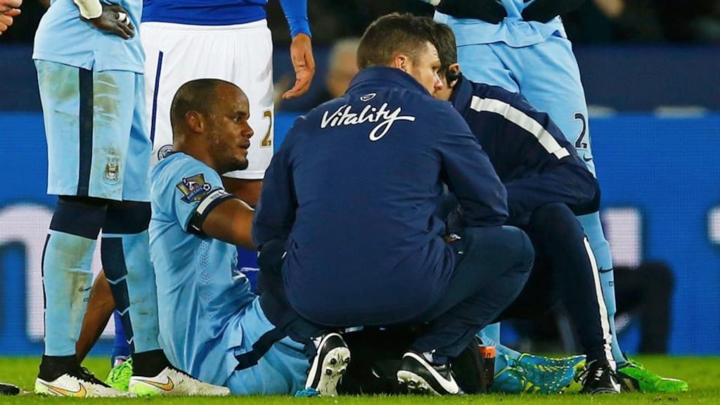 Manchester City’s Vincent Kompany receives treatment after picking up a hamstring injury during the Premier League match against Leicester City at the King Power Stadium. Photograph: Darren Staples/Reuters
