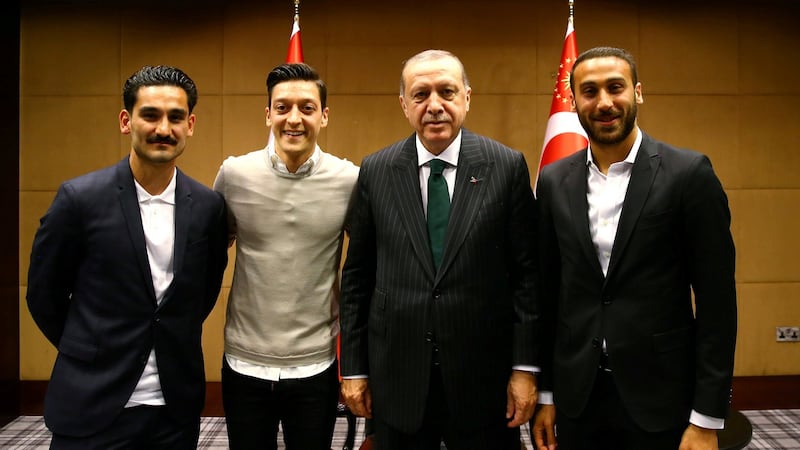 Turkish president Recep Tayyip Erdogan meets Premier League players Ilkay Gündogan, Mesut Özil and Everton’s Cenk Tosun in London. Photograph: Kayhan Ozer/Presidential Palace/Handout via Reuters