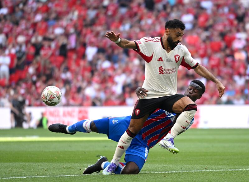 Mohamed Salah of Liverpool is challenged by Marc Guehi of Crystal Palace at Wembley Stadium on Sunday. Photograph: Clive Mason/Getty Images