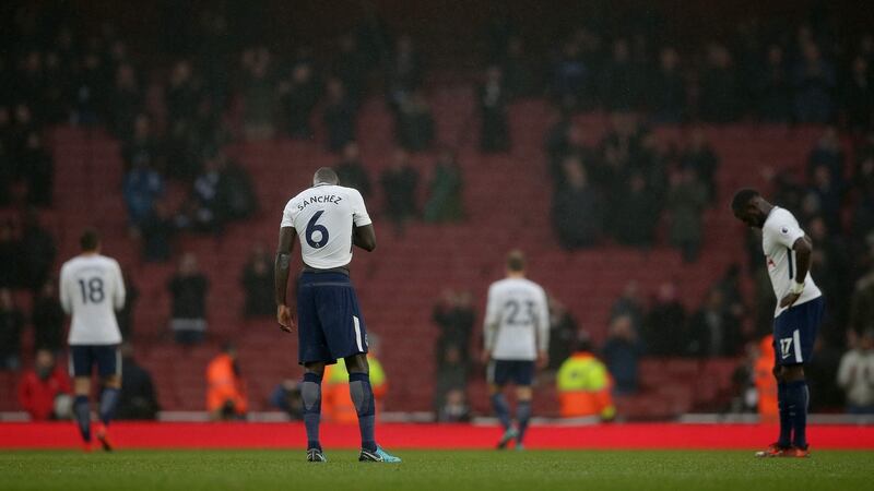 Spurs players react after their 2-0 Premier League loss to Arsenal at the Emirates. Photo: Daniel Leal-Olivas/Getty Images