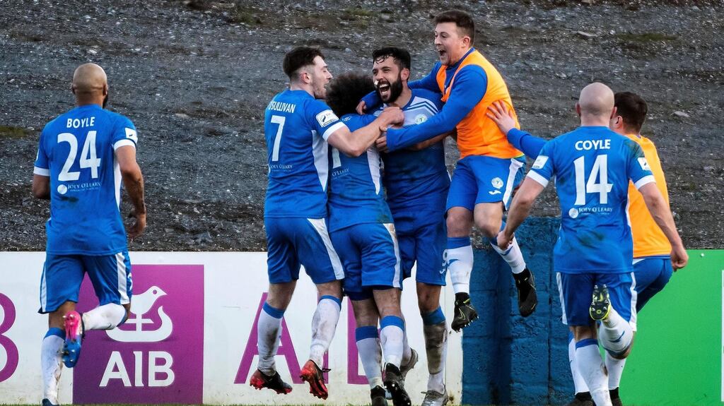Finn Harps’ Dave Webster is mobbed by his team-mates after scoring the stoppage-time winner against Waterford in the SSE Airtricity League Premier Division game at Finn Park in Ballybofey. Photograph: Evan Logan/Inpho