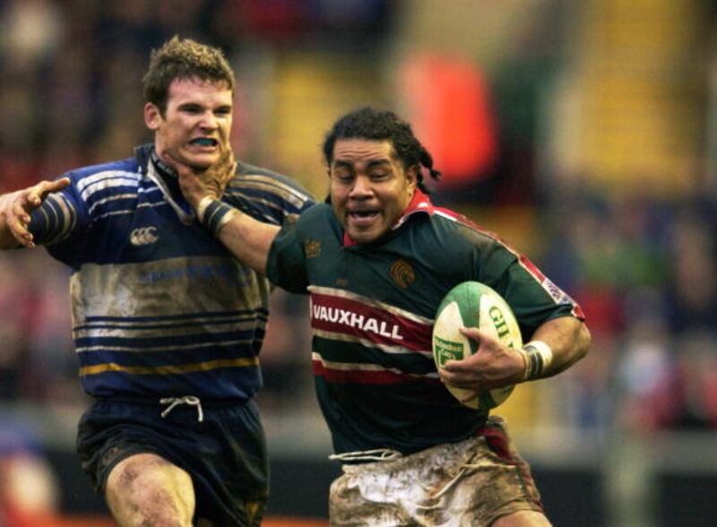Freddie Tuilagi of Leicester Tigers hands off Gordon D''Arcy of Leinster during the Heineken Cup quarter-final in 2002. Photograph: Dave Rogers/Getty Images