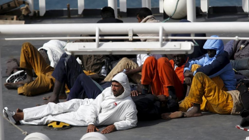 Surviving immigrants lie on the deck of Italian coastguard ship Bruno Gregoretti in Senglea, in Valletta’s Grand Harbour on Monday, April 20th, 2015. Some 700 migrants were feared dead after their boat capsized in the Mediterranean. Photograph: REUTERS/Darrin Zammit Lupi