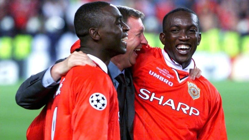 Happier times: Cole with Alex Ferguson and Dwight Yorke after winning the European Cup with United in 1999. Photo: Marcus Brandt/Bongarts/Getty Images
