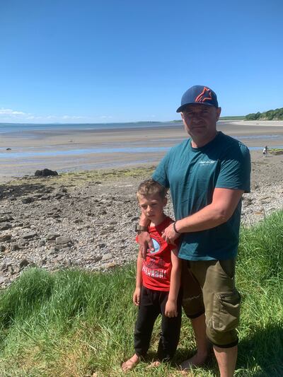 Voitek Stachyra and his son Peter, from Belfast were in the area when a young boy got into difficulty in the water off Lissadell Beach in Co Sligo on Saturday afternoon. Photograph: Sorcha Crowley