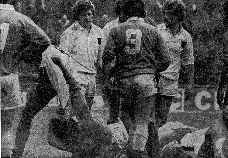 Michael Gibson of Trinity (white shirt) exchanges punches with UCD prop Tom Kavanagh (on ground) during the 1977 colours match. Photo: Peter Thursfield/The Irish Times