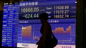Yen soars as BOJ holds steady, stocks rise modestly