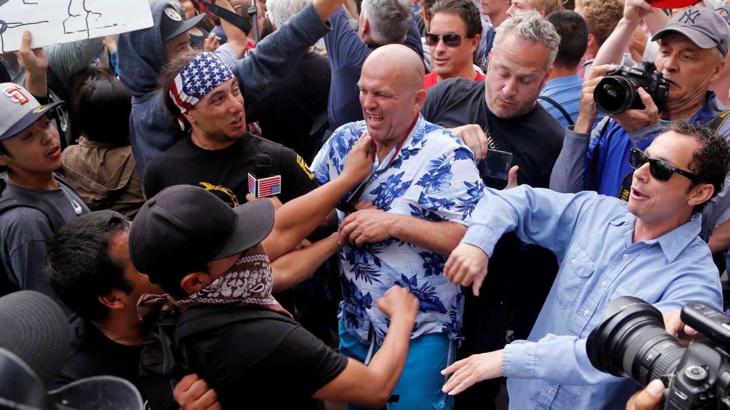 Donald Trump supporters and anti-Trump demonstrators clash outside a campaign event for US presidential candidate in San Diego. Photograph: Reuters