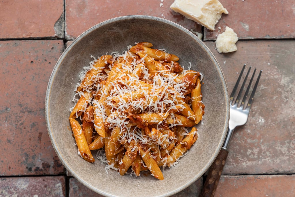 Pork with tomato vodka penne pasta. Photograph: Harry Weir