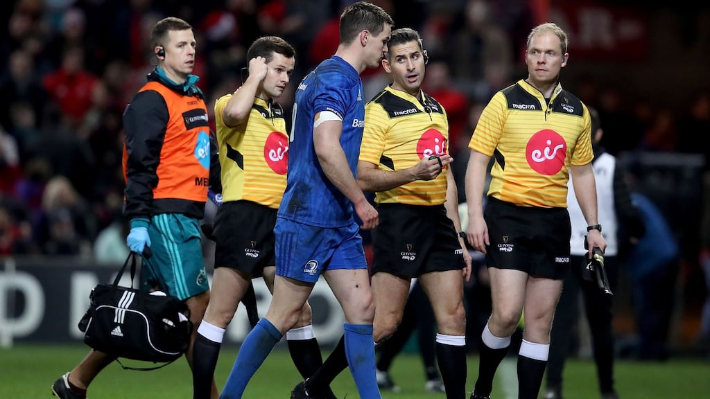 Leinster’s Johnny Sexton talks to referee Frank Murphy during their fractious match against Munster at Thomond Park last month. Photograph: Inpho