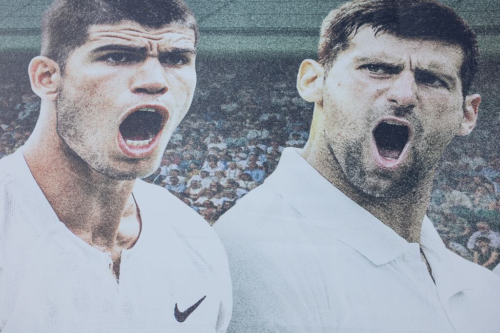 A poster of Carlos Alcaraz and Novak Djokovic at Wimbledon. Photograph: Julian Finney/Gett