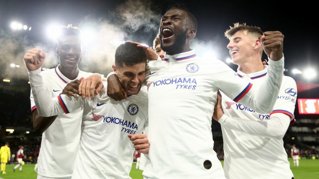 Christian Pulisic of Chelsea celebrates with teammates after scoring his team’s third goal during the Premier League win over Burnley. Photo: Jan Kruger/Getty Images