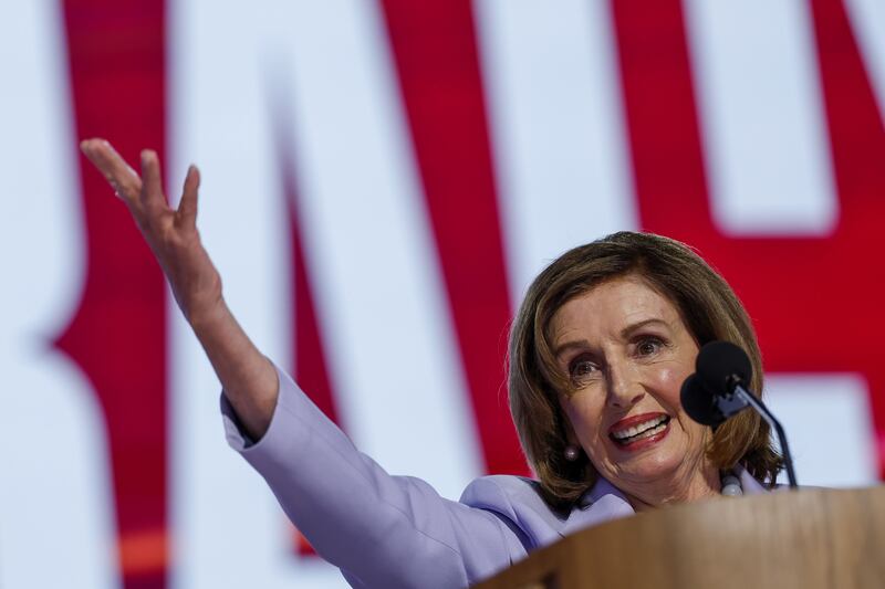 Nancy Pelosi waves to the audience during the third night of the Democratic National Convention. Photograph: Caroline Brehman/EPA-EFE